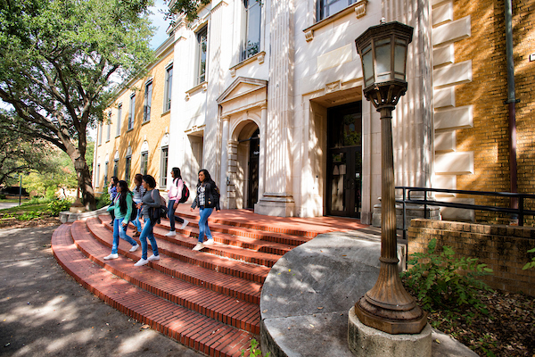 Students exiting a building on campus
