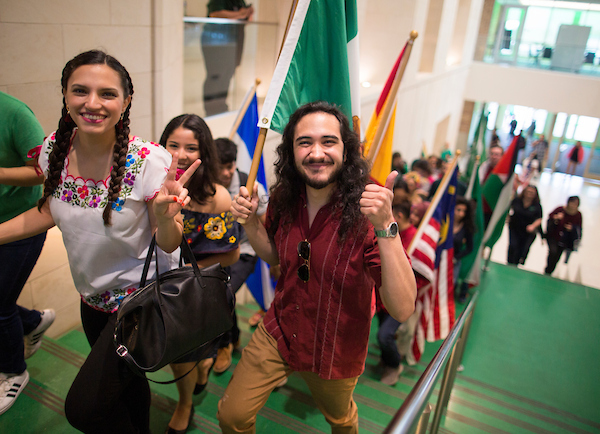 Students and community members participating in the annual Flag Parade