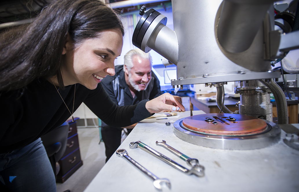UNT professor Marcus Young and his student Sophia Cooper work on hypersonic-related research.