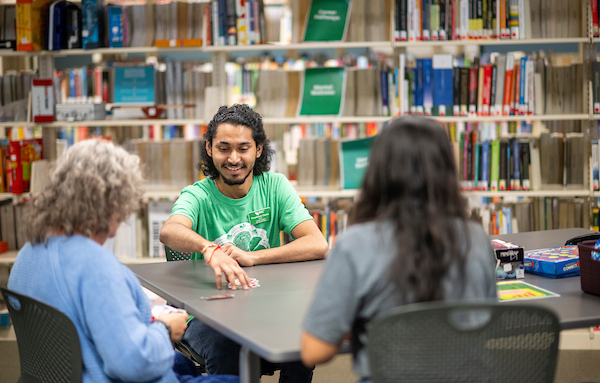 Students and faculty collaborating at the library
