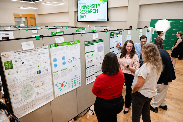 Students and faculty chat at University Research Day