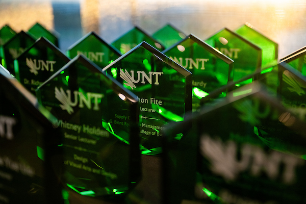 Close-up photo of green resin faculty awards